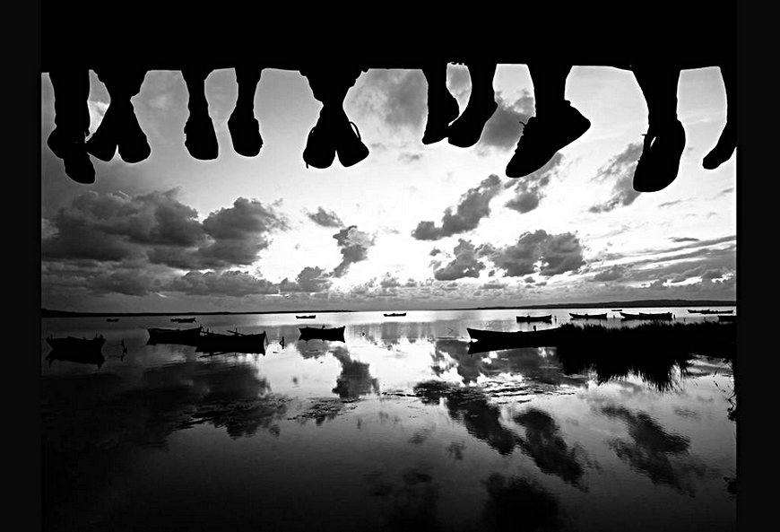 Feet hanging over the dock